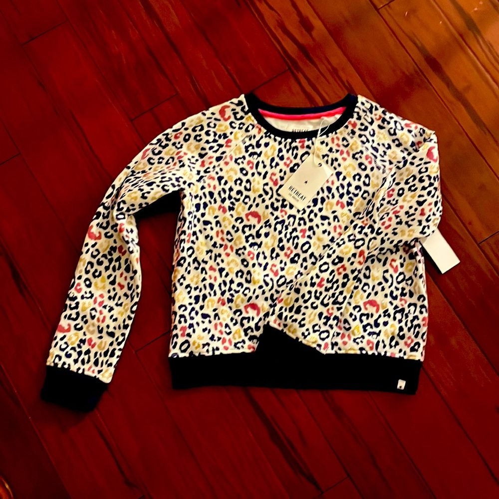 Retreat LA crop sweater! So cute, the gold has glitter.